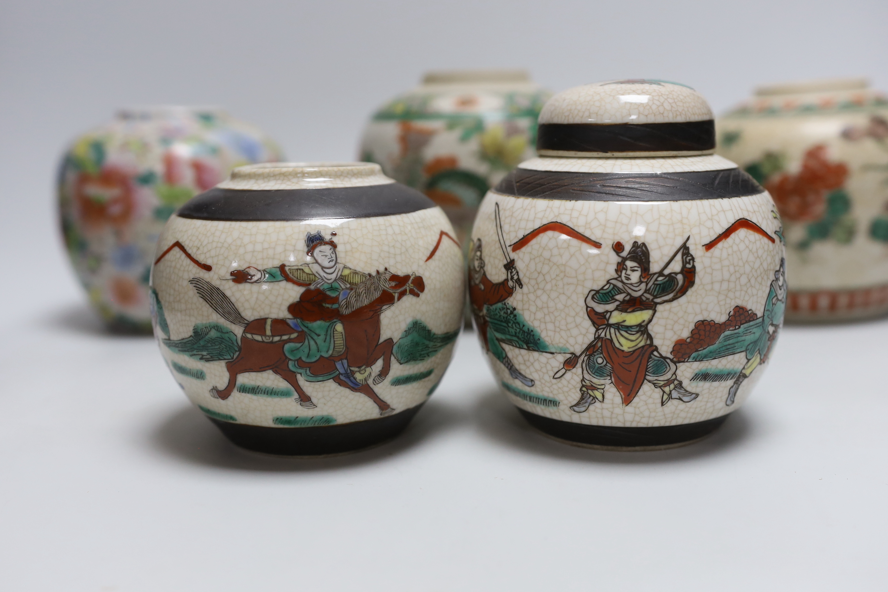 Five Chinese enamelled porcelain ginger jars, one with a cover, tallest 12cm high